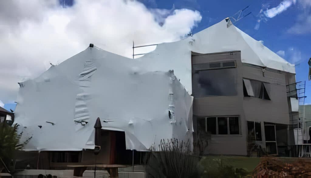 plaster home being re-clad